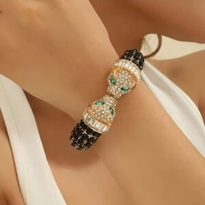 💚🔹️Natasha Couture 🔹️Black and Gold Panther Crystal  Green Eyed Bracelet